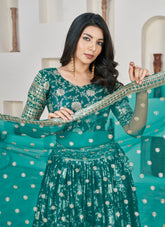 Prominent Lehenga Choli in Rama Colour